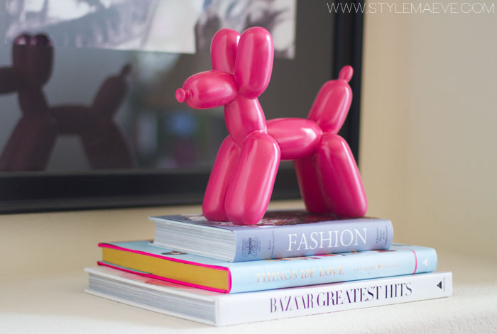 decorating with fashion books and pink balloon dog